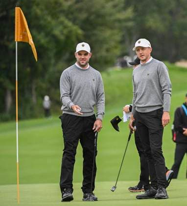 September 25, 2024, Montreal, Pq, Canada: International team members Corey Conners, left, and Mackenzie Hughes of Canada chat on the twelfth green during a practice round at the Presidents Cup at Royal Montreal Golf Club in Montreal, Wednesday, September 25, 2024. Canada News - September 25, 2024  - ZUMAc35_ 20240925_zaf_c35_042 Copyright: xGrahamxHughesx