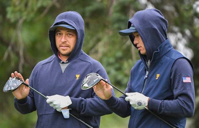 September 25, 2024, Montreal, Pq, Canada: United States team members Xander Schauffele, left, and Collin Morikawa wipe their drivers during a practice round at the Presidents Cup at Royal Montreal Golf Club in Montreal, Wednesday, September 25, 2024. Canada News - September 25, 2024  - ZUMAc35_ 20240925_zaf_c35_014 Copyright: xGrahamxHughesx