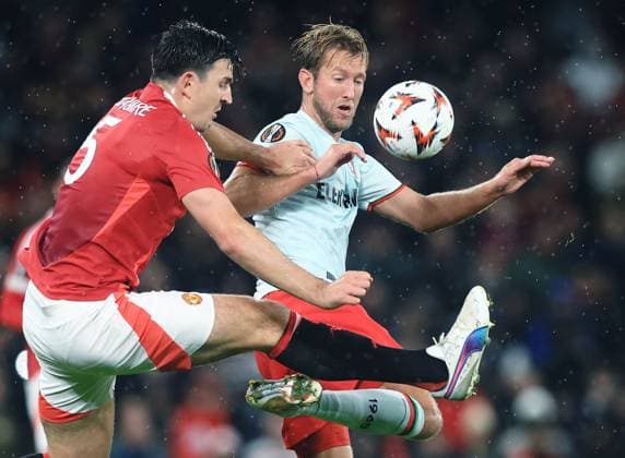 Harry Maguire of Manchester United, ManU and Michel Vlap of FC Twente Manchester United v FC Twente, UEFA Europa League, Group Stage, Football, Old Trafford, Manchester, UK, 25 Sep 2024 EDITORIAL USE ONLY No use with unauthorised audio, video, data, fixture lists, club league logos or live services. Online in-match use limited to 120 images, no video emulation. No use in betting, games or single club league player publications.  Copyright: xMattxWest Shutterstockx 14735174z