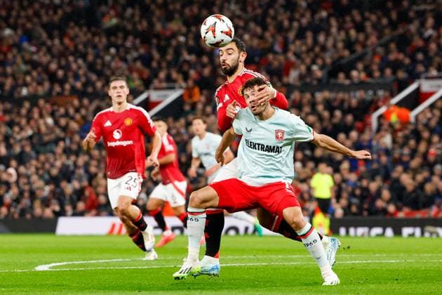 Mitchell van Bergen of FC Twente controls the ball, defends by Bruno Fernandes of Manchester United, ManU , UEFA Europa League 2024 25 League Phase MD1, Manchester United v FC Twente, Old Trafford, September 25, 2024, Manchester, England.