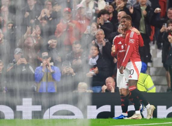 Christian Eriksen of Manchester United, ManU celebrates scoring the opening goal with Marcus Rashford Manchester United v FC Twente, UEFA Europa League, Group Stage, Football, Old Trafford, Manchester, UK, 25 Sep 2024 EDITORIAL USE ONLY No use with unauthorised audio, video, data, fixture lists, club league logos or live services. Online in-match use limited to 120 images, no video emulation. No use in betting, games or single club league player publications.  Copyright: xMattxWest Shutterstockx 14735174ad