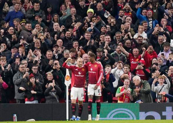 Manchester, England, 25th September 2024. Christian Eriksen of Manchester United, ManU (l) celebrates scoring the first goal with Marcus Rashford of Manchester United (r) during the UEFA Europa League match at Old Trafford, Manchester. Picture credit should read: Andrew Yates Sportimage EDITORIAL USE ONLY. No use with unauthorised audio, video, data, fixture lists, club league logos or live services. Online in-match use limited to 120 images, no video emulation. No use in betting, games or single club league player publications. SPI-3332-0038