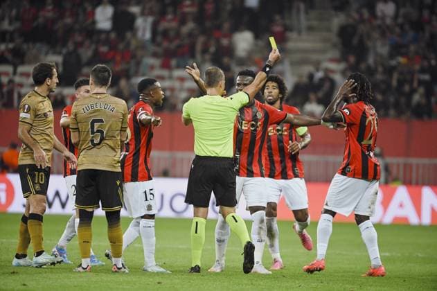 Forward GUESSAND Evann (OGC Nice) receive a yellow card. OGC Nice (FRA) vs Real Sociedad (ESP), C3 J1 Europa League in Allianz Riviera Stadium, NICE, France, on 25 September 2024. FOOTBALL : OGC Nice vs Real sociedad - Europa League - C3 - J1 - 09 25 24 FredDides Panoramic 