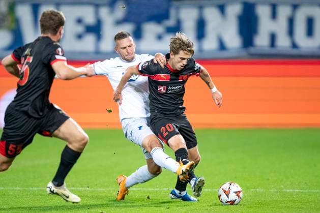 Valdemar Byskov, FC Midtjylland 20 vies for the ball with Pavel Kaderabek, Hoffenheim during their the UEFA Europa League match at MCH Arena in Herning on Wednesday, September 25, 2024 , Herning Denmark Mors  Copyright: BoxAmrstrupx xRitzauxScanpix BoxAmstrupx spdk20240925-231927-L