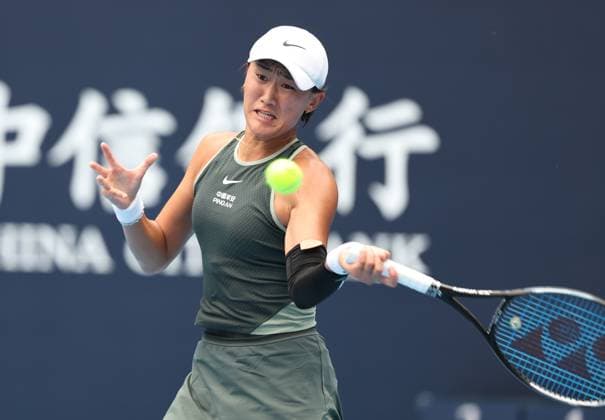 (240926) -- BEIJING, Sept. 26, 2024 -- Wang Xiyu of China hits a return during the women s singles first round match against Viktorija Golubic of Switzerland at 2024 China Open tennis tournament in Beijing, China, Sept. 26, 2024. ) (SP)CHINA-BEIJING-TENNIS-CHINA OPEN-WOMEN S SINGLES-FIRST ROUND (CN) ZhangxChen 