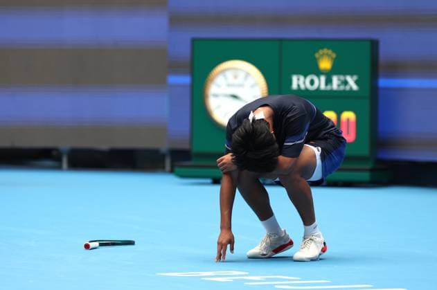(240926) -- BEIJING, Sept. 26, 2024 -- Zhou Yi of China reacts after the men s singles first round match against Pavel Kotov of Russia at 2024 China Open tennis tournament in Beijing, China, Sept. 26, 2024. ) (SP)CHINA-BEIJING-TENNIS-CHINA OPEN-MEN S SINGLES-FIRST ROUND (CN) ZhangxChen 