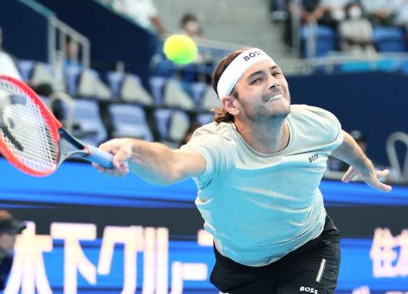 September 26, 2024, Tokyo, Japan - Taylor Fritz of the United States retuens the ball against Arthur Fils of France at the first round match of the Japan Open Tennis championships at the Ariake Colosseum in Tokyo on Thursday, September 26, 2024. (photo by Yoshio Tsunoda AFLO) Noxthirdxpartyxsales  (267885434)