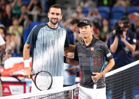 Marin Cilic CRO and Kei Nishikori pose at the net before the start of the match, Kinoshita Group Japan Open Tennis Championships, Tokyo, Japan Copyright: xJuergenxHasenkopfx