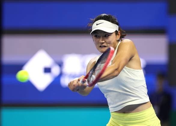 (240926) -- BEIJING, Sept. 26, 2024 -- Wang Yafan hits a return during the women s singles first round match between Wang Yafan of China and Ashlyn Krueger of the United States at 2024 China Open tennis tournament in Beijing, capital of China, Sept. 26, 2024. ) (SP)CHINA-BEIJING-TENNIS-CHINA OPEN-WOMEN S SINGLES-FIRST ROUND (CN) ZhangxChen 