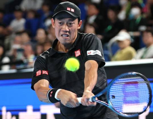 September 26, 2024, Tokyo, Japan - Japan s Kei Nishikori retuens the ball against Marin Cilic of Croatia at the first round match of the Japan Open Tennis championships at the Ariake Colosseum in Tokyo on Thursday, September 26, 2024. (photo by Yoshio Tsunoda AFLO) Noxthirdxpartyxsales  (0764908358st)