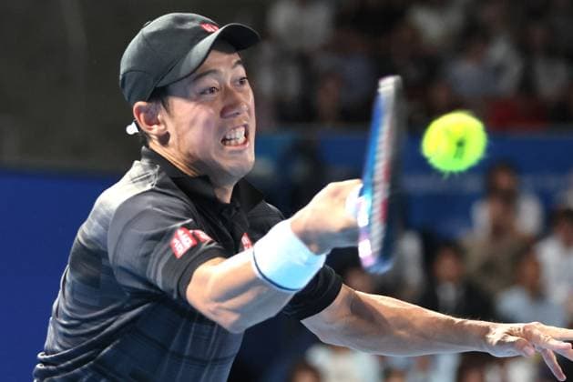 September 26, 2024, Tokyo, Japan - Japan s Kei Nishikori retuens the ball against Marin Cilic of Croatia at the first round match of the Japan Open Tennis championships at the Ariake Colosseum in Tokyo on Thursday, September 26, 2024. (photo by Yoshio Tsunoda AFLO) Noxthirdxpartyxsales  (0764908382st)