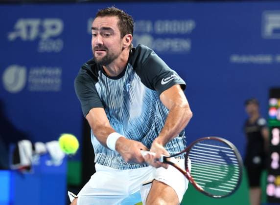 September 26, 2024, Tokyo, Japan - Marin Cilic of Croatia retuens the ball against Kei Nishikori of Japan at the first round match of the Japan Open Tennis championships at the Ariake Colosseum in Tokyo on Thursday, September 26, 2024. (photo by Yoshio Tsunoda AFLO) Noxthirdxpartyxsales  (0764910497st)