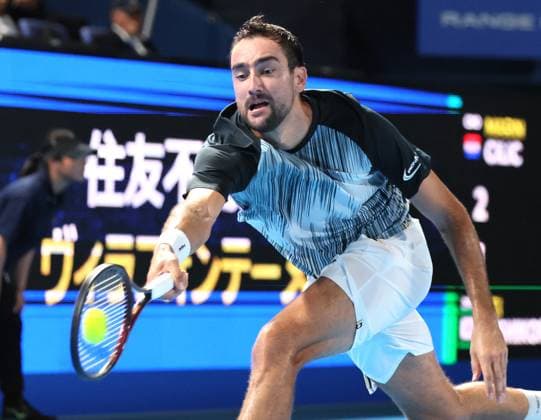 September 26, 2024, Tokyo, Japan - Marin Cilic of Croatia retuens the ball against Kei Nishikori of Japan at the first round match of the Japan Open Tennis championships at the Ariake Colosseum in Tokyo on Thursday, September 26, 2024. (photo by Yoshio Tsunoda AFLO) Noxthirdxpartyxsales  (0764910551st)
