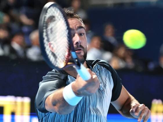 September 26, 2024, Tokyo, Japan - Marin Cilic of Croatia retuens the ball against Kei Nishikori of Japan at the first round match of the Japan Open Tennis championships at the Ariake Colosseum in Tokyo on Thursday, September 26, 2024. (photo by Yoshio Tsunoda AFLO) Noxthirdxpartyxsales  (0764910553st)