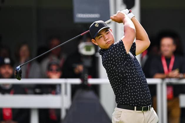MONTREAL, QC - SEPTEMBER 26: International Team golfer Tom Kim takes a practice swing on first hole at the 2024 Presidents Cup on September 26, 2024 at The Royal Montreal Golf Club in Montreal, QC (Photo by David Kirouac Icon Sportswire) GOLF: SEP 26 Presidents Cup EDITORIAL USE ONLY Icon240926034