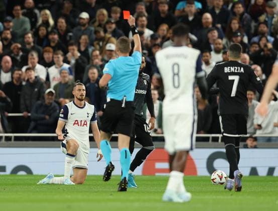 London, England, 26th September 2024. Tottenham s Radu Dragusin is shown a red card during the UEFA Europa League match at the Tottenham Hotspur Stadium, London. Picture credit should read: Paul Terry Sportimage EDITORIAL USE ONLY. No use with unauthorised audio, video, data, fixture lists, club league logos or live services. Online in-match use limited to 120 images, no video emulation. No use in betting, games or single club league player publications. SPI-3334-0016