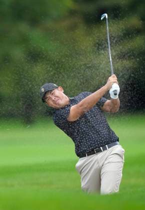 September 26, 2024, Montreal, Qc, CANADA: International team member Byeong Hun An of South Korea, blast his shot from the fairway bunker on the fourth hole during first round four-ball match at the Presidents Cup golf tournament at the Royal Montreal Golf Club, in Montreal on Thursday, September 26, 2024. Canada News - September 26, 2024  - ZUMAc35_ 20240926_zaf_c35_129 Copyright: xNathanxDenettex