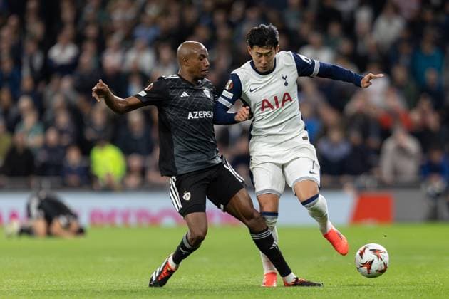 Tottenham Hotspur v FK QARABAG Europa League 26 09 2024. QarabaÄü midfielder Julio Romao (q6) tackles Tottenham Hotspur forward Son Heung-Min (7) during the Europa League match between Tottenham Hotspur and FK Qarabag at Tottenham Hotspur Stadium, London, United Kingdom on 26 September 2024. Editorial use only , Copyright: xIanxStephenx PSI-20487-0013