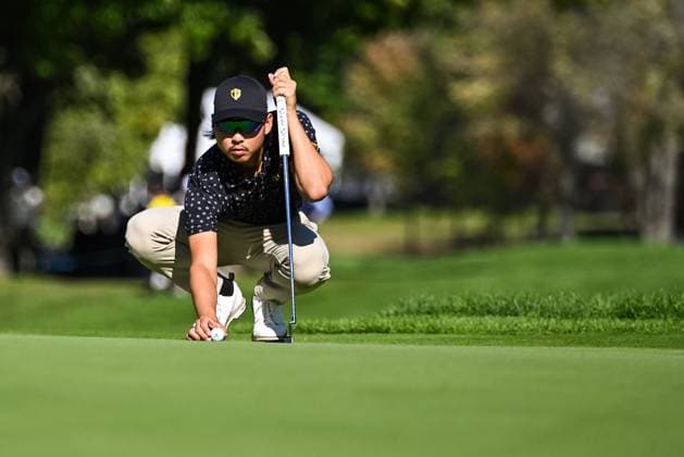 MONTREAL, QC - SEPTEMBER 26: International Team golfer Min Woo Lee drops his ball on the green on the eleventh hole at the 2024 Presidents Cup on September 26, 2024 at The Royal Montreal Golf Club in Montreal, QC (Photo by David Kirouac Icon Sportswire) GOLF: SEP 26 Presidents Cup EDITORIAL USE ONLY Icon240926078