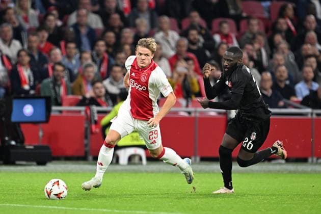 AMSTERDAM - (l-r) Christian Rasmussen of Ajax, Arthur Masuaku of Besiktas JK during the UEFA Europa League match between AFC Ajax Amsterdam and Besiktas JK at the Johan Cruijff ArenA on Sept. 26, 2024 in Amsterdam, Netherlands. ANP OLAF KRAAK UEFA Europa League 2024 25 League Phase MD1 2024 25 xVIxANPxSportx xxANPxIVx 509449683 originalFilename: 509449683.jpg
