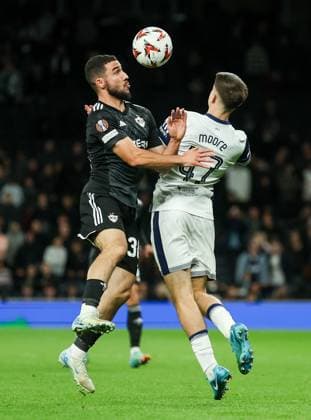 Mikey Moore of Tottenham Hotspur competes with Abbas Hüseynov of Qarabag Tottenham Hotspur v Qarabag, UEFA Europa League, Group Stage, Football, Tottenham Hotspur Stadium, London, UK, 26 Sep 2024 EDITORIAL USE ONLY No use with unauthorised audio, video, data, fixture lists, club league logos or live services. Online in-match use limited to 120 images, no video emulation. No use in betting, games or single club league player publications.  Copyright: xAndrewxFosker Shutterstockx 14739040aw