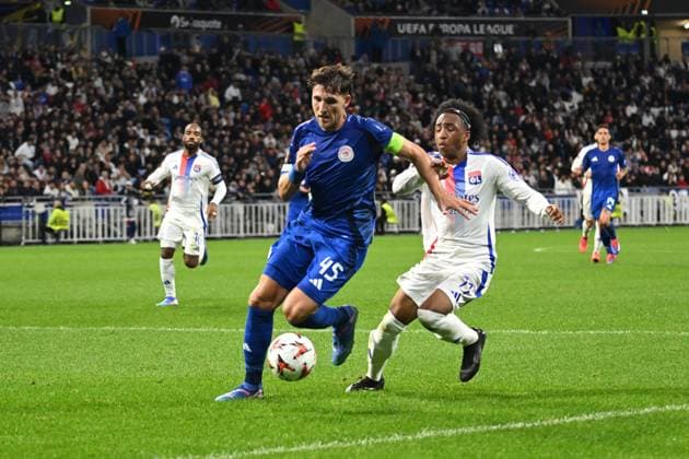 Malick Fofana (lyon) vs Panagiotis Retsos (olympiakos) FOOTBALL: Olympique Lyonnais vs Olympiakos Le Pir?e - 26 09 2024 FredericChambert Panoramic 