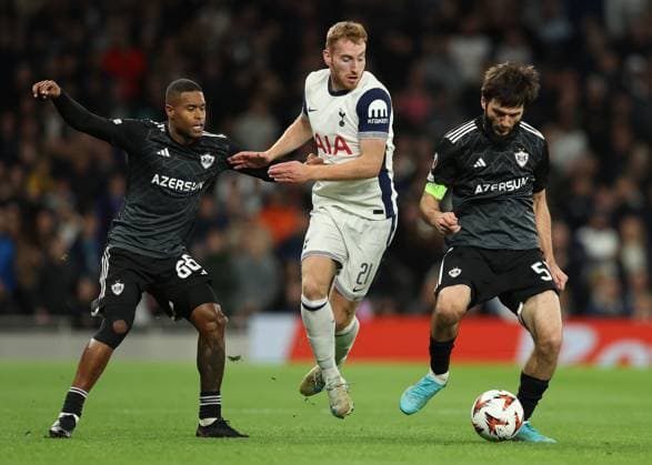 London, England, 26th September 2024. Tottenham™s Dejan Kulusevski is challenged by Qarabag™s Patrick Andrade (L) and Batavia Huseynov during the UEFA Europa League match at the Tottenham Hotspur Stadium, London. Picture credit should read: Paul Terry Sportimage EDITORIAL USE ONLY. No use with unauthorised audio, video, data, fixture lists, club league logos or live services. Online in-match use limited to 120 images, no video emulation. No use in betting, games or single club league player publications. SPI-3334-0039