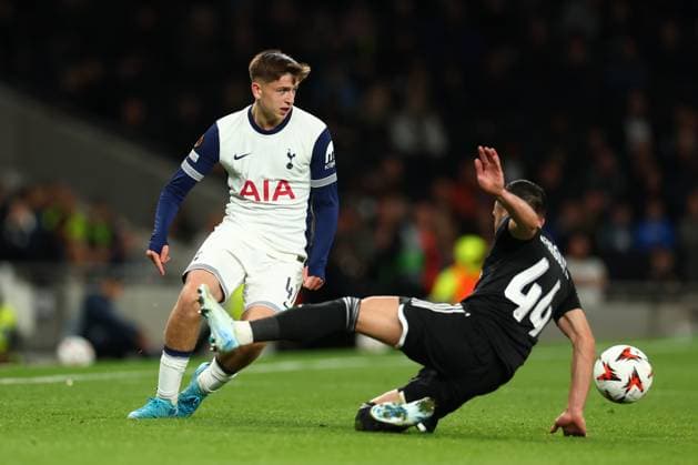 26th September 2024; Tottenham Hotspur Stadium, London, England; UEFA Europa League Football, Tottenham Hotspur versus Qarabag; Mikey Moore of Tottenham Hotspur takes on Elvin Cafarguliyev of Qarabag  ActionPlus12696762 ShaunxBrooks