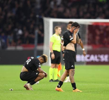 2024-09-26 AFC Ajax v Besiktas JK - UEFA Europa League 2024 25 League Phase MD1 AMSTERDAM, NETHERLANDS - SEPTEMBER 26: Cher Ndour of Besiktas JK and Can Keles of Besiktas JK disappointed during the UEFA Europa League 2024 25 League Phase MD1 match between AFC Ajax and Besiktas JK at Johan Cruijff Arena on September 26, 2024 in Amsterdam, Netherlands. (Photo by Peter Lous BSR Agency) Amsterdam Netherlands Content not available for redistribution in The Netherlands directly or indirectly through any third parties. Copyright: xBSRxAgencyx