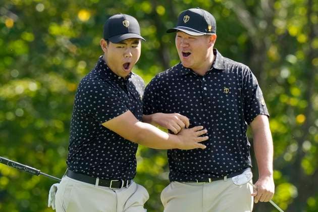 September 26, 2024, Montreal, Pq, Canada: International team members Tom Kim of South Korea and Sungjae Im of South Korea celebrate a birdie putt on the 7th hole during their first round four-ball match at the Presidents Cup golf tournament at the Royal Montreal Golf Club in Montreal, Thursday, Sept. 26, 2024. Canada News - September 26, 2024  - ZUMAc35_ 20240926_zaf_c35_176 Copyright: xFrankxGunnx