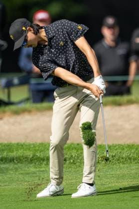 MONTREAL, QC - SEPTEMBER 26: International Team golfer Min Woo Lee plays his shot from the fairway at the 2024 Presidents Cup on September 26, 2024 at The Royal Montreal Golf Club in Montreal, QC (Photo by Vincent Ethier Icon Sportswire) GOLF: SEP 26 Presidents Cup EDITORIAL USE ONLY Icon240926036