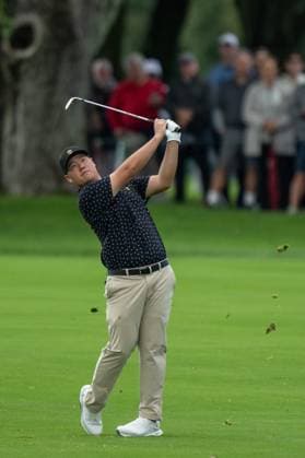 MONTREAL, QC - SEPTEMBER 26: International Team golfer Sungjae Im plays his shot from the fairway at the 2024 Presidents Cup on September 26, 2024 at The Royal Montreal Golf Club in Montreal, QC (Photo by Vincent Ethier Icon Sportswire) GOLF: SEP 26 Presidents Cup EDITORIAL USE ONLY Icon240926062