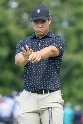 MONTREAL, QC - SEPTEMBER 26: International Team golfer Tom Kim on the second green at the 2024 Presidents Cup on September 26, 2024 at The Royal Montreal Golf Club in Montreal, QC (Photo by Vincent Ethier Icon Sportswire) GOLF: SEP 26 Presidents Cup EDITORIAL USE ONLY Icon240926070