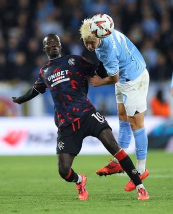 Mohamed Diomande of Rangers competes for the ball with Otto Rosengren of Malmo Malmo v Rangers, UEFA Europa League, Group Stage, Football, Eleda Stadion, Malmo, Sweden, 26 Sep 2024 EDITORIAL USE ONLY No use with unauthorised audio, video, data, fixture lists, club league logos or live services. Online in-match use limited to 120 images, no video emulation. No use in betting, games or single club league player publications.  Copyright: xMichaelxZemanek Shutterstockx 14739047ay