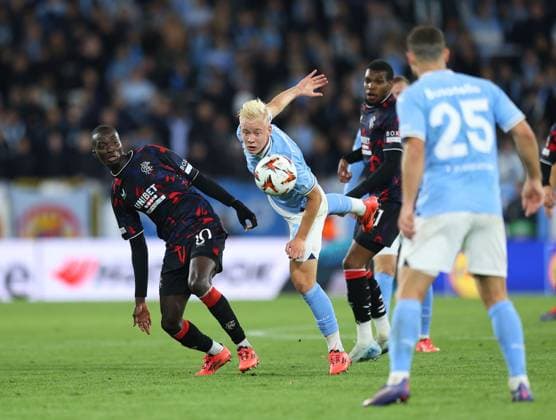 Mohamed Diomande of Rangers competes for the ball with Otto Rosengren of Malmo Malmo v Rangers, UEFA Europa League, Group Stage, Football, Eleda Stadion, Malmo, Sweden, 26 Sep 2024 EDITORIAL USE ONLY No use with unauthorised audio, video, data, fixture lists, club league logos or live services. Online in-match use limited to 120 images, no video emulation. No use in betting, games or single club league player publications.  Copyright: xMichaelxZemanek Shutterstockx 14739047az