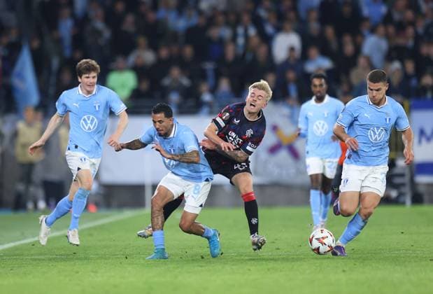 Ross McCausland of Rangers is fouled by Sergio Pena of Malmo Malmo v Rangers, UEFA Europa League, Group Stage, Football, Eleda Stadion, Malmo, Sweden, 26 Sep 2024 EDITORIAL USE ONLY No use with unauthorised audio, video, data, fixture lists, club league logos or live services. Online in-match use limited to 120 images, no video emulation. No use in betting, games or single club league player publications.  Copyright: xMichaelxZemanek Shutterstockx 14739047be