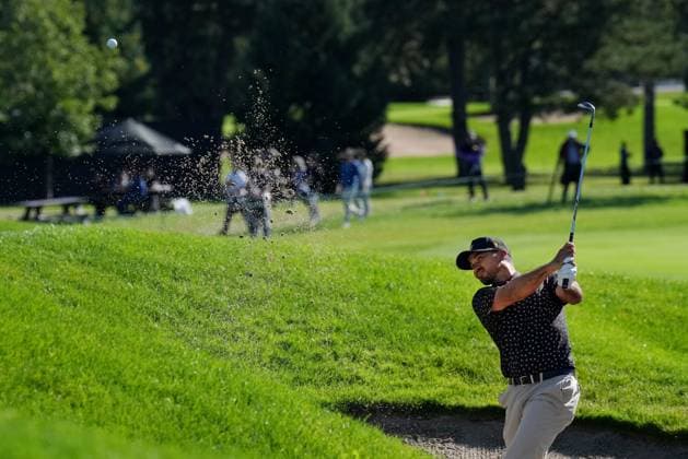 September 26, 2024, Montreal, Pq, Canada: International team member Jason Day of Australia, blasts out of the bunker on the 12th hole during their first round four-ball match at the Presidents Cup golf tournament at the Royal Montreal Golf Club in Montreal, Thursday, Sept. 26, 2024. Canada News - September 26, 2024  - ZUMAc35_ 20240926_zaf_c35_199 Copyright: xNathanxDenettex