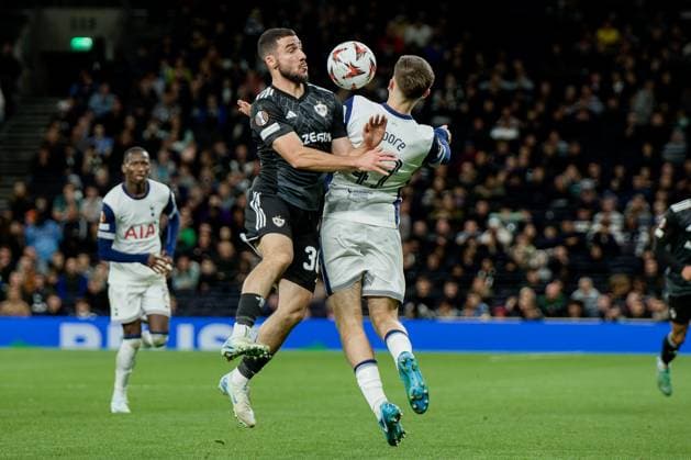 London, England, September 27 2024: Mikey Moore (47 Tottenham Hotspur) and Abbas Huseynov (30 Qarabag FK) in action during the UEFA Europa League game between Tottenham Hotspur and Qarabag FK at Tottenham Hotspur Stadium in London, England. (Pedro Porru SPP) Copyright: xPedroxPorrux xSPPx spp-en-PePoSp-4F8A6586_DxO
