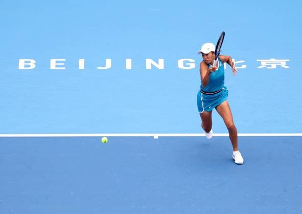 (240927) -- BEIJING, Sept. 27, 2024 -- Zhang Shuai of China hits a return during the women s singles second round match against Emma Navarro of the United States at 2024 China Open tennis tournament in Beijing, capital of China, Sept. 27, 2024. ) (SP)CHINA-BEIJING-TENNIS-CHINA OPEN-WOMEN S SINGLES-SECOND ROUND (CN) ZhangxChenlin 