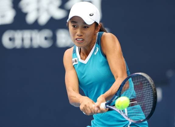 (240927) -- BEIJING, Sept. 27, 2024 -- Zhang Shuai of China hits a return during the women s singles second round match against Emma Navarro of the United States at 2024 China Open tennis tournament in Beijing, capital of China, Sept. 27, 2024. ) (SP)CHINA-BEIJING-TENNIS-CHINA OPEN-WOMEN S SINGLES-SECOND ROUND (CN) ZhangxChenlin 