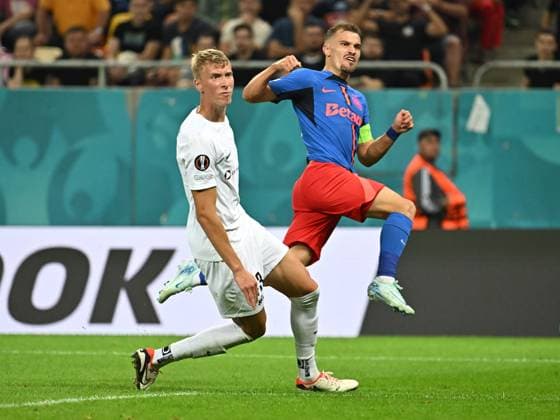 Darius Dumitru Olaru scores a goal from close to Å½iga Lipuöek during the UEFA Europa League match between FCSB and RFS at the Arena Nationala in Bucharest, Thursday, September 26, 2024 Bucharest Copyright: xRazvanxPasarica SPORTxPICTURESx