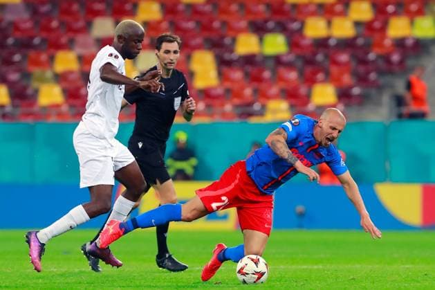 (240927) -- BUCHAREST, Sept. 27, 2024 -- FK RFS s Victor Osuagwu (L) vies with FCSB s Vlad Chiriches during a UEFA Europa League match between FCSB and FK RFS in Bucharest, Romania, Sept. 26, 2024. (Photo by Xinhua) (SP)ROMANIA-BUCHAREST-UEFA EUROPA LEAGUE-FCSB VS FK RFS CristianxCristel 