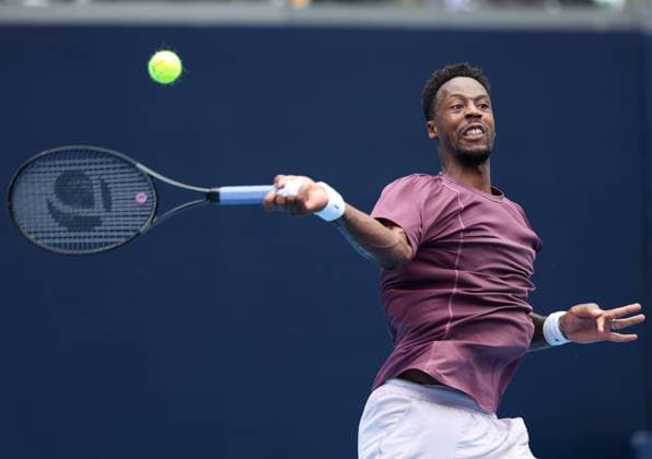 (240927) -- BEIJING, Sept. 27, 2024 -- Gael Monfils hits a return during the men s singles first round match between Daniil Medvedev of Russia and Gael Monfils of France at 2024 China Open tennis tournament in Beijing, capital of China, Sept. 27, 2024. ) (SP)CHINA-BEIJING-TENNIS-CHINA OPEN-MEN S SINGLES-FIRST ROUND (CN) ZhangxChenlin 