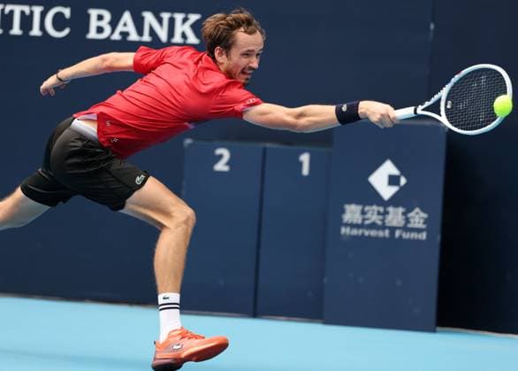 (240927) -- BEIJING, Sept. 27, 2024 -- Daniil Medvedev hits a return during the men s singles first round match between Daniil Medvedev of Russia and Gael Monfils of France at 2024 China Open tennis tournament in Beijing, capital of China, Sept. 27, 2024. ) (SP)CHINA-BEIJING-TENNIS-CHINA OPEN-MEN S SINGLES-FIRST ROUND (CN) ZhangxChenlin 