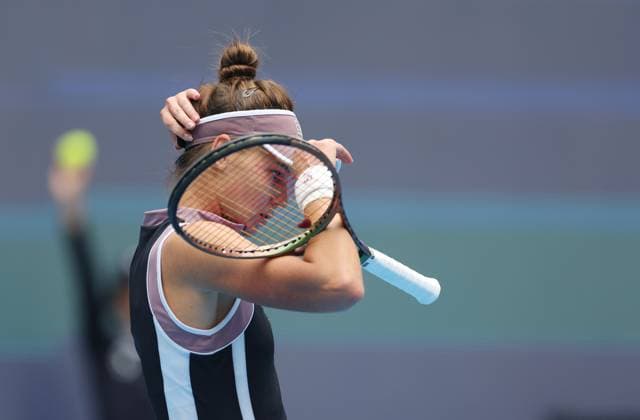 (240927) -- BEIJING, Sept. 27, 2024 -- Veronika Kudermetova reacts during the women s singles second round match between Wang Xinyu of China and Veronika Kudermetova of Russia at 2024 China Open tennis tournament in Beijing, capital of China, Sept. 27, 2024. ) (SP)CHINA-BEIJING-TENNIS-CHINA OPEN-WOMEN S SINGLES-SECOND ROUND (CN) BaixXuefei 
