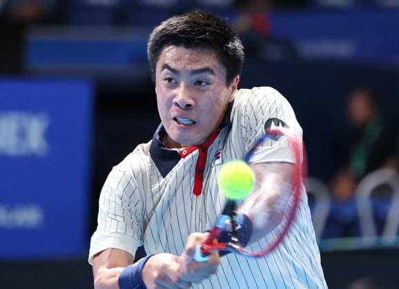 September 27, 2024, Tokyo, Japan - Brandon Nakashima of the United States retuens the ball against Ugo Humbert of France at the second round match of the Japan Open Tennis championships at the Ariake Colosseum in Tokyo on Friday, September 27, 2024. Berrettini withdrew the game after the first set. (photo by Yoshio Tsunoda AFLO) Noxthirdxpartyxsales  (268014475)