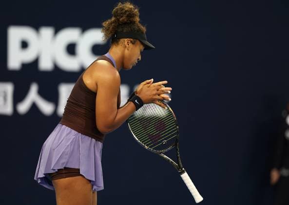 (240927) -- BEIJING, Sept. 27, 2024 -- Osaka Naomi reacts during the women s singles second round match between Osaka Naomi of Japan and Yulia Putintseva of Kazakhstan at 2024 China Open tennis tournament in Beijing, capital of China, Sept. 27, 2024. ) (SP)CHINA-BEIJING-TENNIS-CHINA OPEN-WOMEN S SINGLES-SECOND ROUND (CN) ZhangxChenlin 
