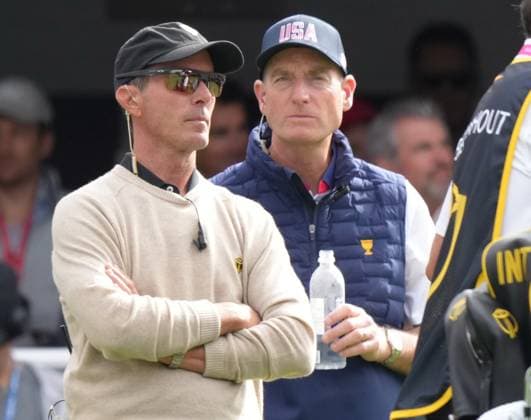 September 27, 2024, Montreal, Pq, Canada: International team captain Mike Weir, left, and USA captain Jim Fury watch the opening tee offs during second round foursome match at the Presidents Cup golf tournament at Royal Montreal Golf Club in Montreal, Friday, Sept. 27, 2024. Golf 2024: Presidents Cup: Round Two  - ZUMAc35_ 20240927_zaf_c35_025 Copyright: xNathanxDenettex