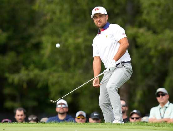 September 27, 2024, Montreal, Pq, Canada: United States team member Xander Schauffele chips onto the second green during second round foursome match at the Presidents Cup golf tournament at Royal Montreal Golf Club in Montreal, Friday, Sept. 27, 2024. Golf 2024: Presidents Cup: Round Two  - ZUMAc35_ 20240927_zaf_c35_028 Copyright: xFrankxGunnx