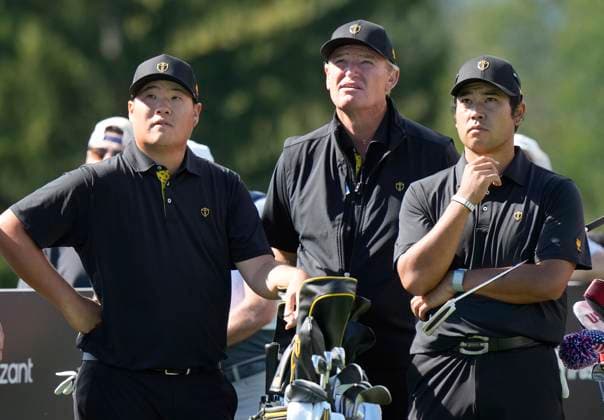 September 27, 2024, Montreal, Pq, Canada: International team member Sungjae Im of South Korea, left, assistant captain Ernie Els, and International team member Hideki Matsuyama of Japan, watch team USA tee off on the 7th hole during the second round foursome match at the Presidents Cup golf tournament at Royal Montreal Golf Club in Montreal, Friday Sept. 27, 2024. Golf 2024: Presidents Cup: Round Two - ZUMAc35_ 20240927_zaf_c35_034 Copyright: xFrankxGunnx